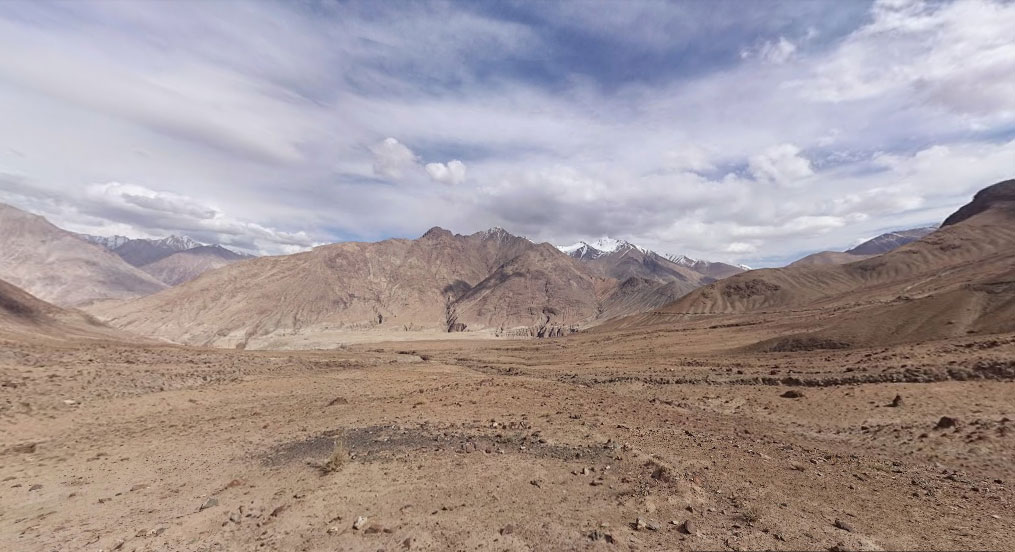 Desolate mountains as we drive toward nubra valley from Khardung-La top