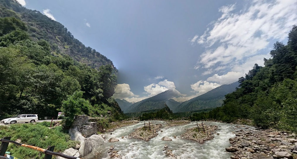 View from a small bridge crossing the River Beas